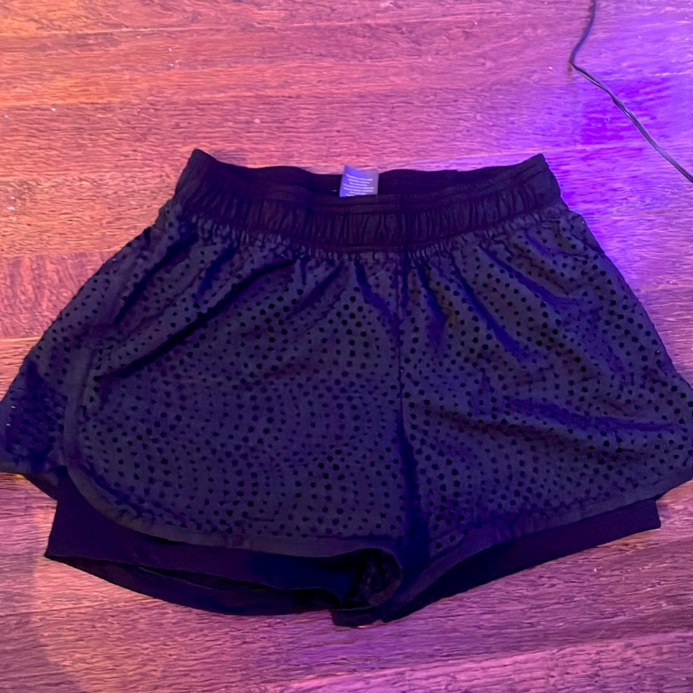 This is a girls black sporting short size 10-14